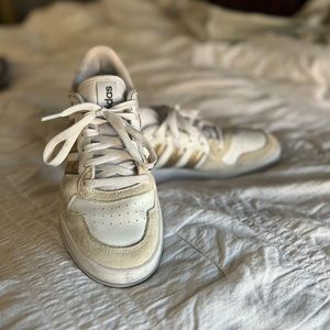 Women’s white adidas sneakers with suede and texture